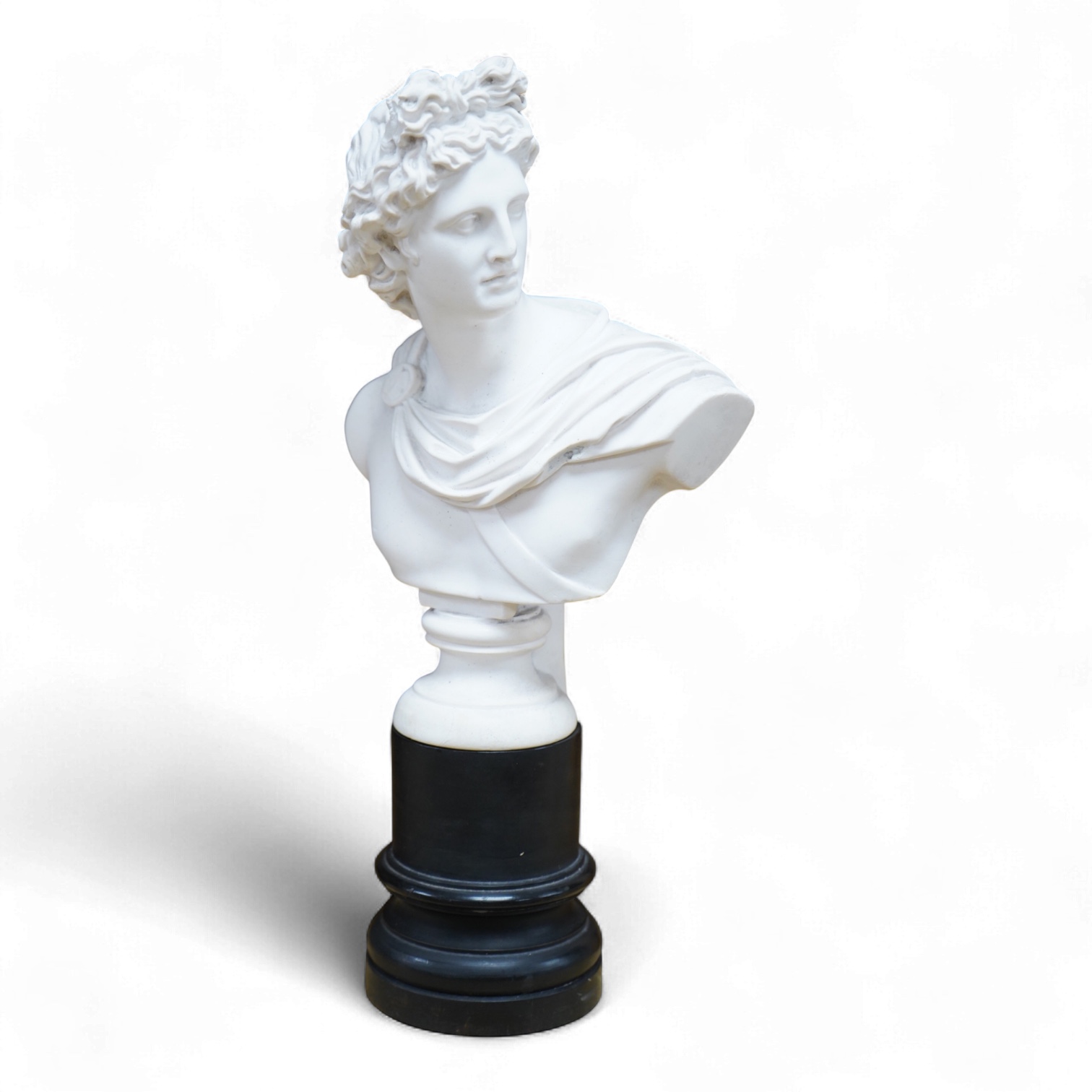 A 19th century plaster bust of Apollo Belvedere, 32cm